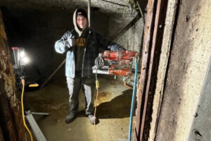 KJs cutting team working in basement